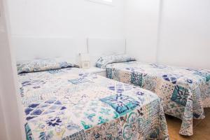 En eller flere senge i et værelse på Los Cristianos 3