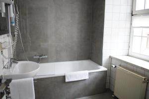 Koupelna v ubytování Hotel Am Obermarkt