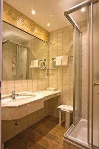 Łazienka w obiekcie Landhotel Alpenhof Filzmoos
