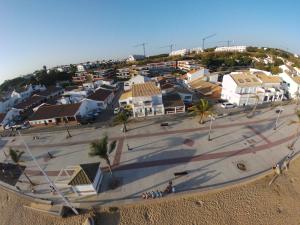 an aerial view of a town with houses and a street at Apartamentos en Paseo Maritimo in El Rompido
