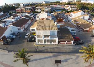 an aerial view of a town with houses and cars at Apartamentos en Paseo Maritimo in El Rompido