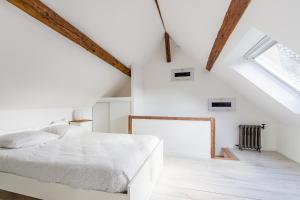 מיטה או מיטות בחדר ב-La Parenthèse