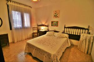 A bed or beds in a room at Apartamento Añon