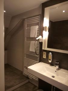 Koupelna v ubytování Hotel Am Obermarkt