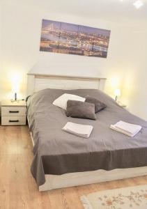 Postel nebo postele na pokoji v ubytování Apartment Queen