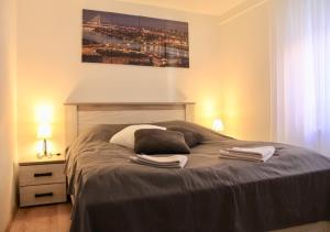 Postel nebo postele na pokoji v ubytování Apartment Queen