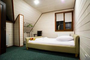 Postel nebo postele na pokoji v ubytování Hotel Galushko