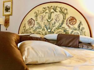 Postel nebo postele na pokoji v ubytování Agriturismo Podere Pescara