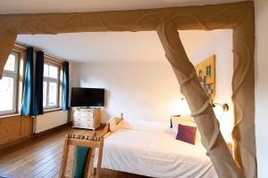 Postel nebo postele na pokoji v ubytování Hotel Aegidienhof