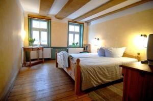 Postel nebo postele na pokoji v ubytování Hotel Aegidienhof