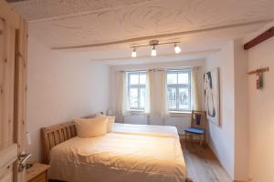 Postel nebo postele na pokoji v ubytování Hotel Aegidienhof