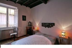 A bed or beds in a room at Nido tra le cupole, terrazza panoramica, Wi-Fi , AC