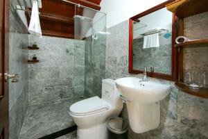 Vannituba majutusasutuses Threeway Riverside Villa
