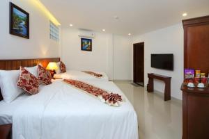 Voodi või voodid majutusasutuse Threeway Riverside Villa toas