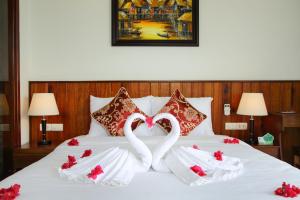 Voodi või voodid majutusasutuse Threeway Riverside Villa toas
