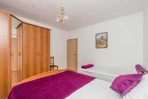 Postel nebo postele na pokoji v ubytování Apartment Matošić