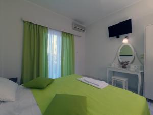 A bed or beds in a room at Studios Magda