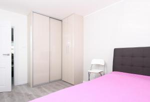 Posteľ alebo postele v izbe v ubytovaní Apartment Carlo 7D