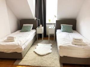 Posteľ alebo postele v izbe v ubytovaní Podwale 29 by Homeprime