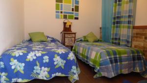Кровать или кровати в номере A Casa da Maria
