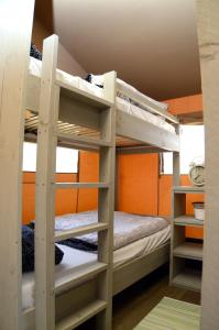 a bunk bed room with two bunk beds at Grande Glamping with Pool in Biograd na Moru