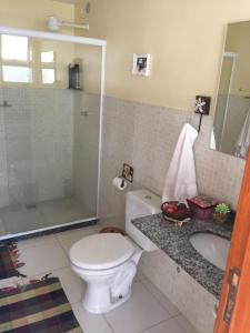 Ванная комната в Maravilha na serra - próximo ao centro
