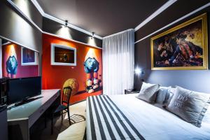Postel nebo postele na pokoji v ubytování Admiral Art Hotel