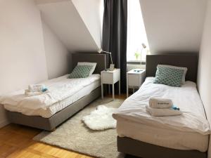 Posteľ alebo postele v izbe v ubytovaní Podwale 29 by Homeprime