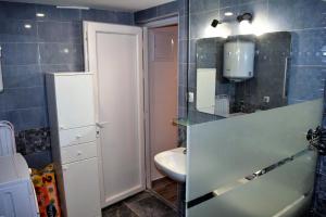 Kúpeľňa v ubytovaní Veritas Apartments