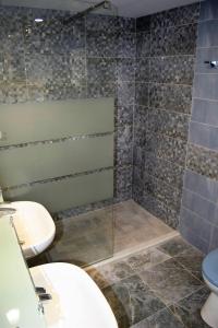Kúpeľňa v ubytovaní Veritas Apartments