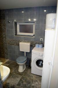 Kúpeľňa v ubytovaní Veritas Apartments