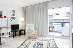 TV i/ili multimedijalni sistem u objektu SilkFab Apartments