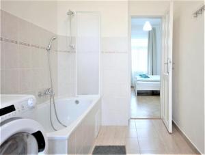Koupelna v ubytování Angel City Aparthotel