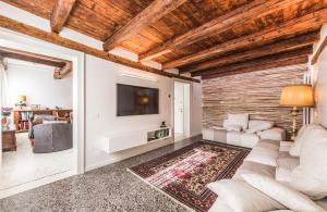 Χώρος καθιστικού στο Apartment Cà Brunilda-luxury penthouse with terrace