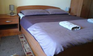 Postel nebo postele na pokoji v ubytování Apartment Mara