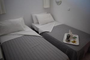 Łóżko lub łóżka w pokoju w obiekcie Cielomar Benalmadena costa