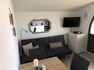 Posedenie v ubytovaní Villa Lorenta Apartments