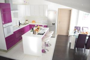 Kuchyň nebo kuchyňský kout v ubytování Apartments Milas
