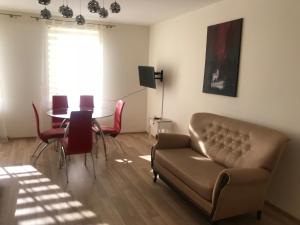 Posedenie v ubytovaní Apartament Rodzinny S8