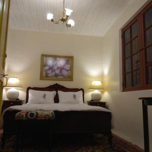 Un ou plusieurs lits dans un hébergement de l'établissement Hostel Pousada Rheingantz Rio Grande