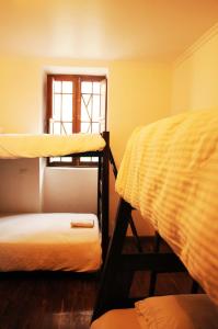 Postel nebo postele na pokoji v ubytování Arche Noah Boutique Hostel