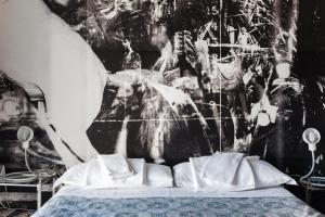 Postel nebo postele na pokoji v ubytování Albergo Ristorante San Giors