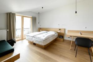 Postelja oz. postelje v sobi nastanitve Calva B&B Apartments
