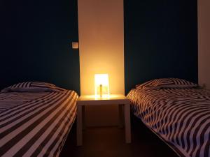 Ένα ή περισσότερα κρεβάτια σε δωμάτιο στο Casa Io - Goraz