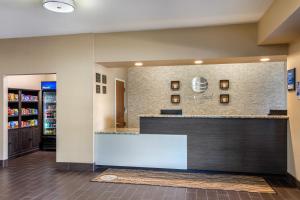 a lobby of a pharmacy with a counter at Comfort Inn South Chesterfield - Colonial Heights in Colonial Heights