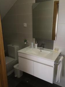 Koupelna v ubytování Casinha do Rossio