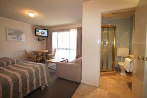 Postel nebo postele na pokoji v ubytování Beaumaris Bay Motel