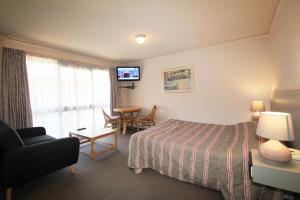 TV a/nebo společenská místnost v ubytování Beaumaris Bay Motel