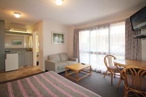 Kuchyň nebo kuchyňský kout v ubytování Beaumaris Bay Motel