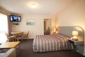 Postel nebo postele na pokoji v ubytování Beaumaris Bay Motel